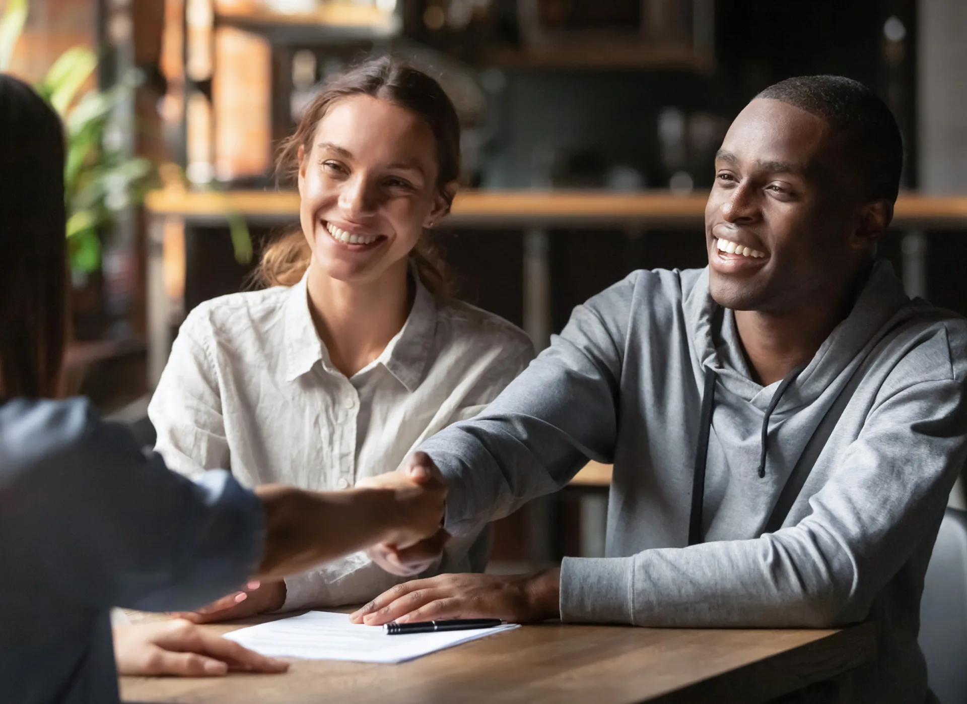 Couple closing a deal